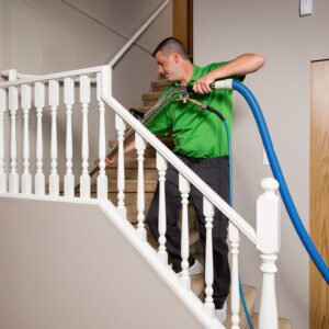 professional carpet cleaner cleaning the stairs